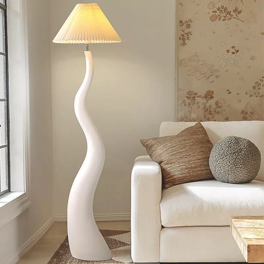 Sinuous Floor Lamp: Curved design for a warm, charming glow