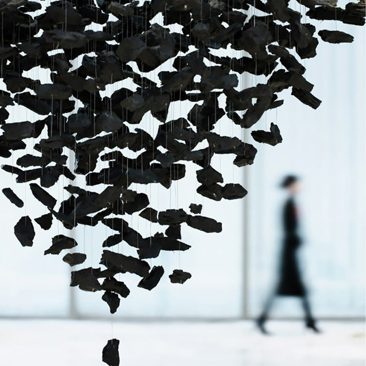 Lustre moderne en pierre et charbon de bois